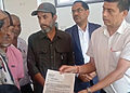 Santosh Subedi, coordinator of 'Bachna De Sarkar', hands over a memorandum to Chief District Officer Shivlal Gelal, accompanied by Ranabahadur Officer and Balak Simrik Chaudhary, inside the district administration office in Chandranagar, Jhapa.