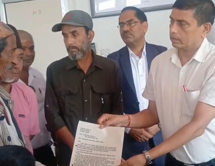Santosh Subedi, coordinator of 'Bachna De Sarkar', hands over a memorandum to Chief District Officer Shivlal Gelal, accompanied by Ranabahadur Officer and Balak Simrik Chaudhary, inside the district administration office in Chandranagar, Jhapa.